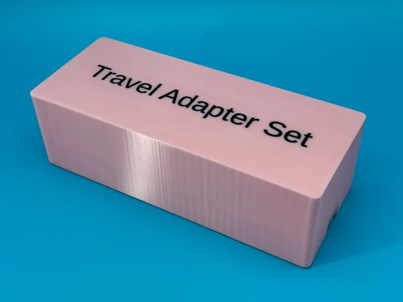 Travel power adapter storage box